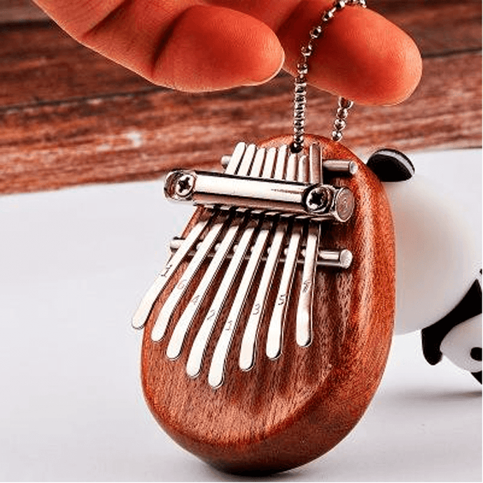 8 Keys mini thumb piano MBJRC